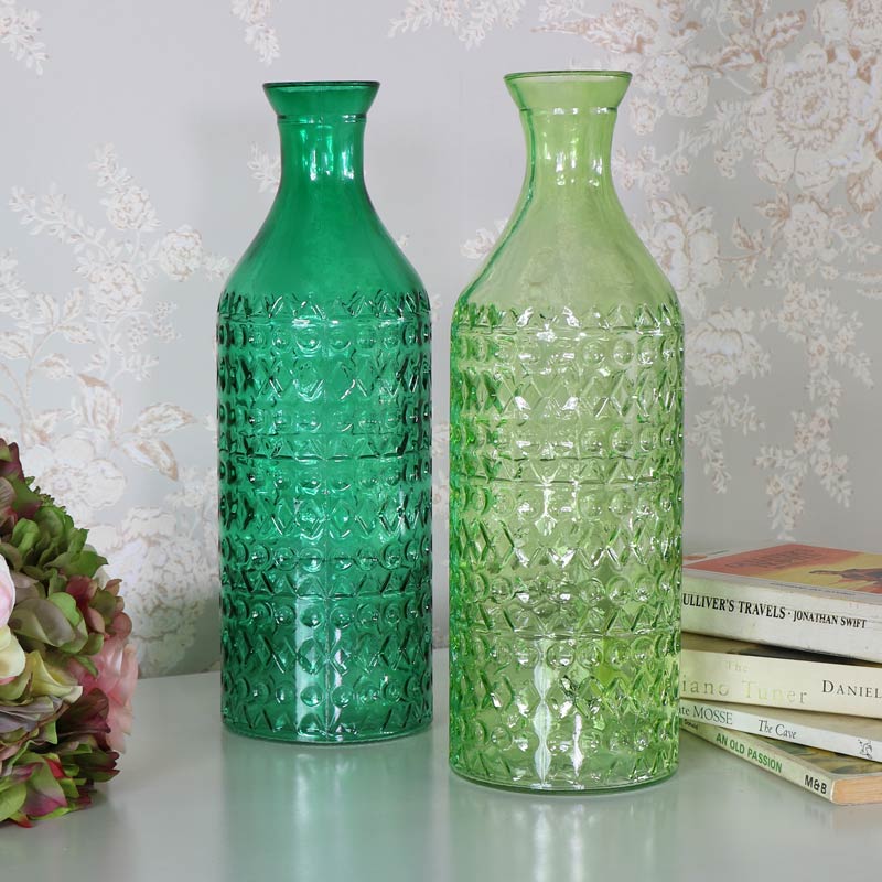 Pair of Green Glass Decorative Bottles
