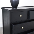 Black 4 Drawer Chest of drawers with gold knobs