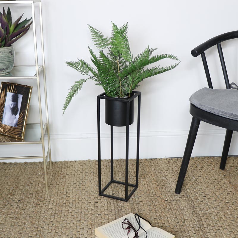 Black plant stand indoor